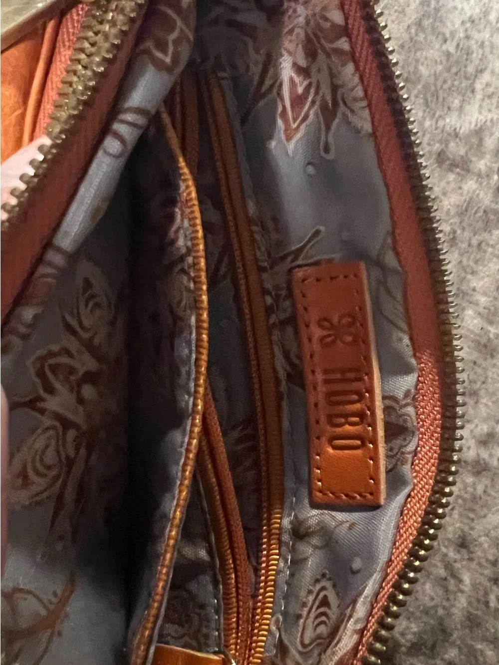 HOBO Leather Wristlet Wallet in Coral peach. 7 1/2x5